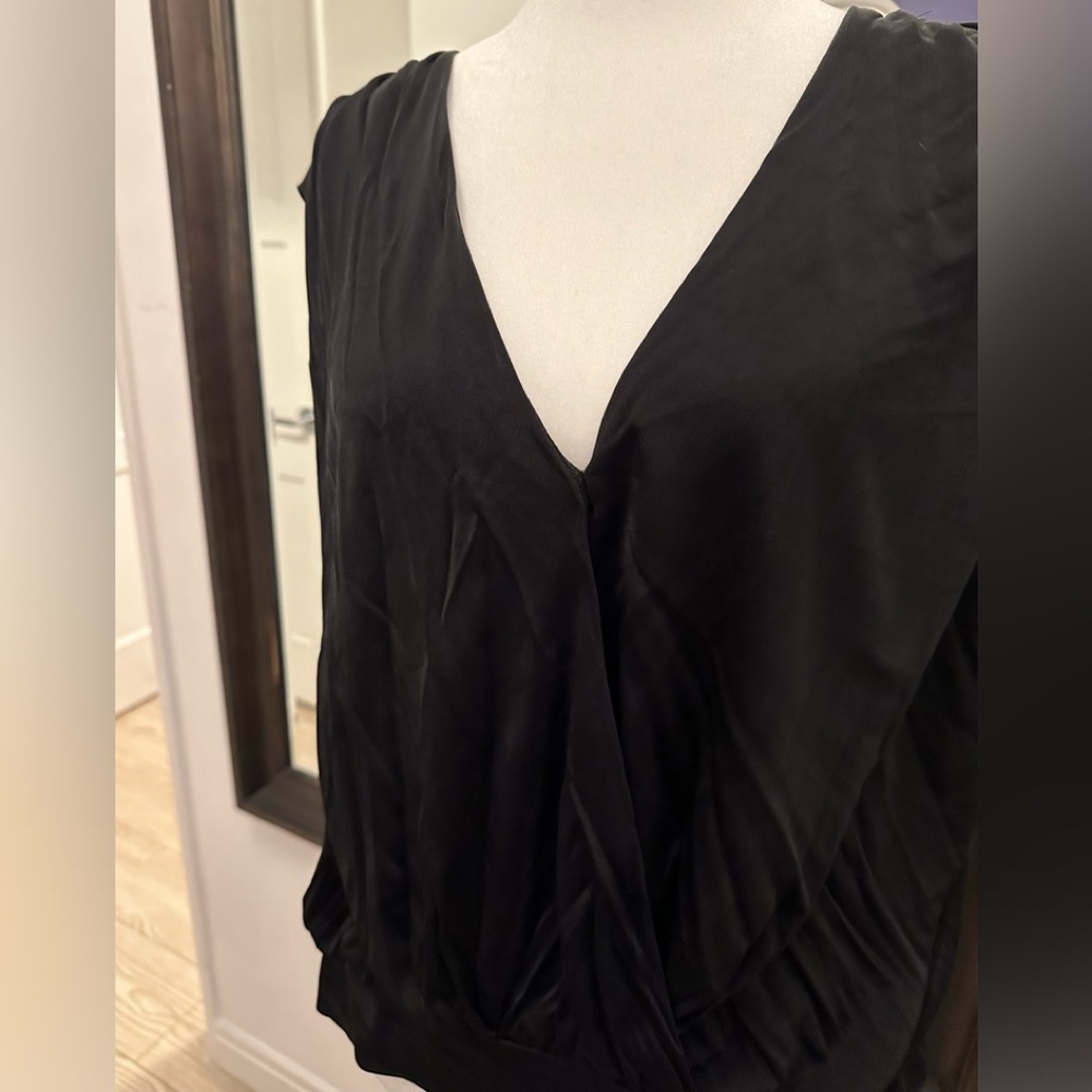 Bebe size Medium Jersey stretch top. Never worn size medium